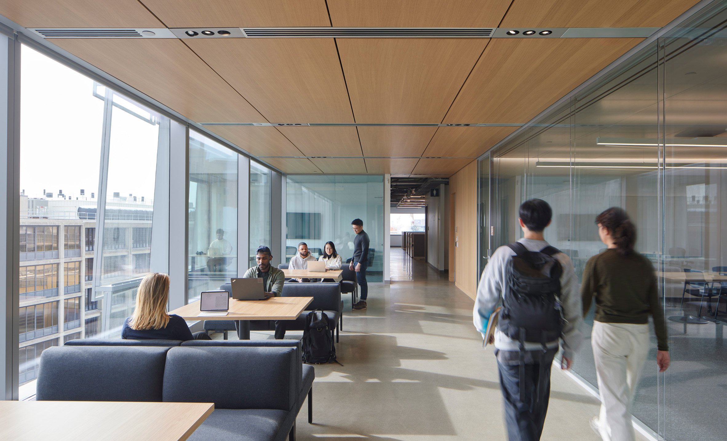 Interior corridor lined with wood and glass