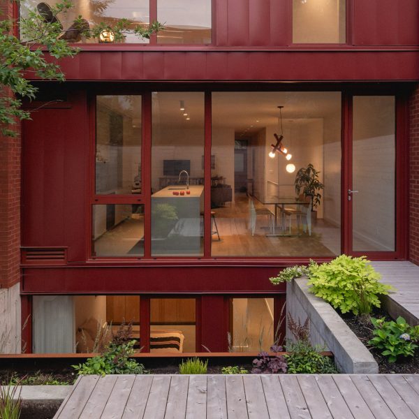 Naturehumaine uses "Merlot" red palette for duplex renovation in Montreal