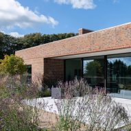 BakerBrown Studio salvages materials from fire-ruined bungalow for South Downs home