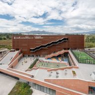 Nómena Arquitectura and ARE shad  school in Bogotá with perforated metal panels