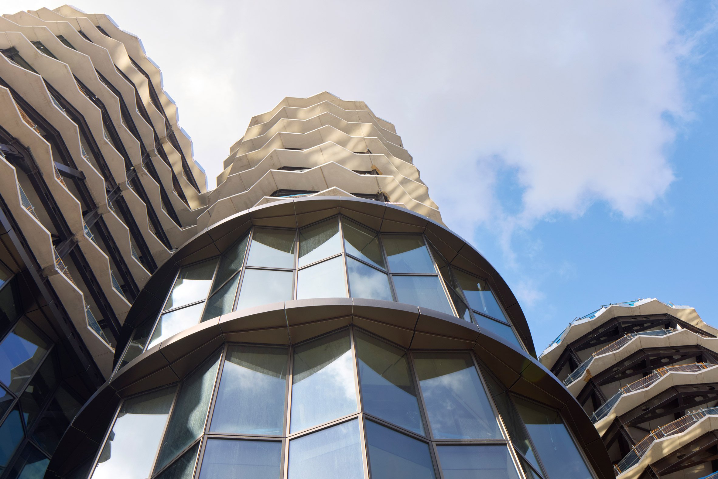 Faceted office towers by Heatherwick Studio and SPPARC