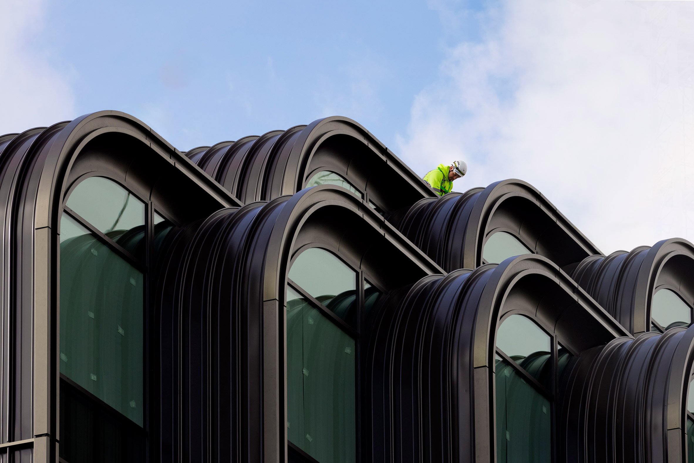 Arched windows in a London events centre by Heatherwick Studio and SPPARC