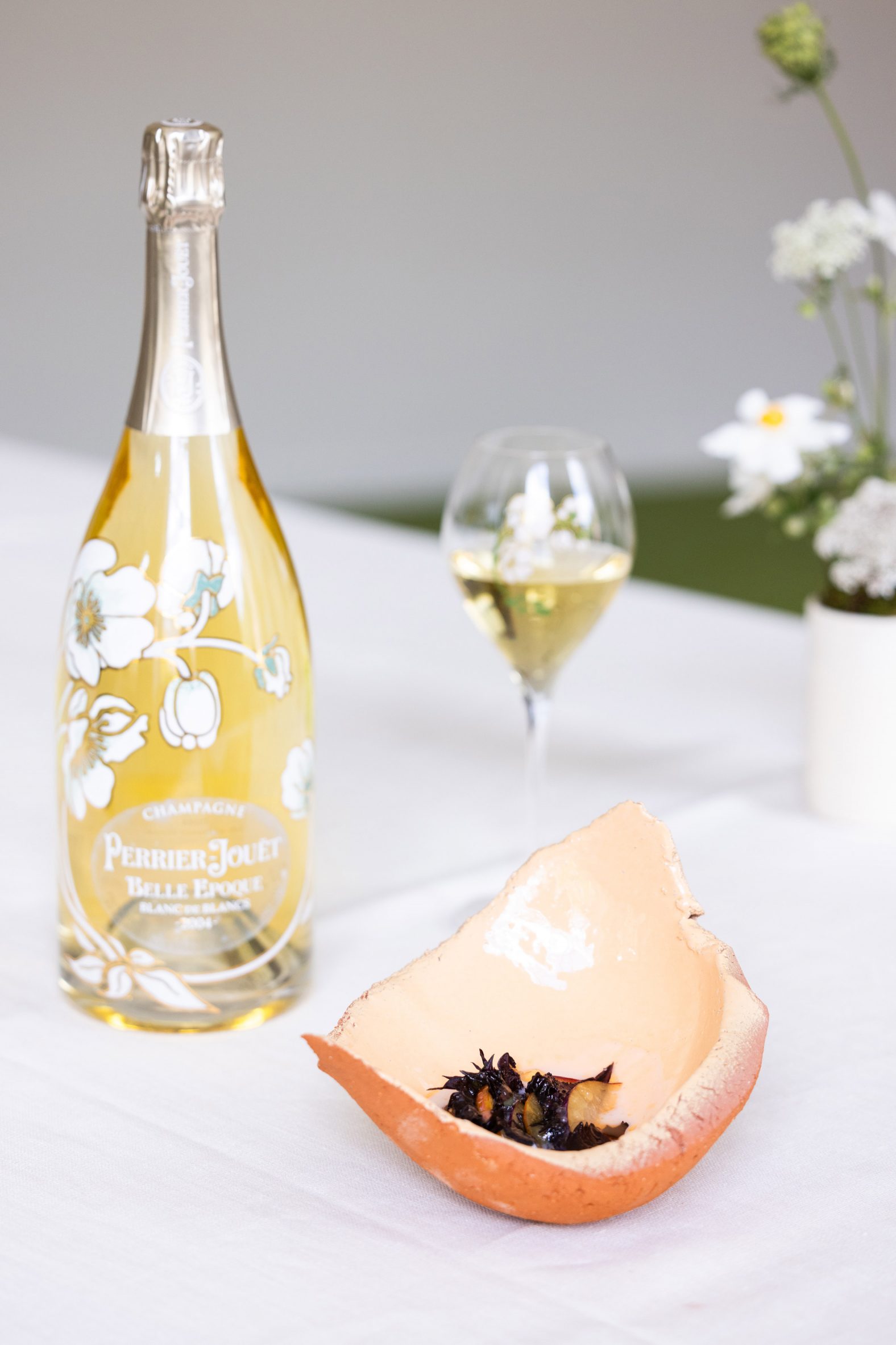 Bottle of champagne on dining table