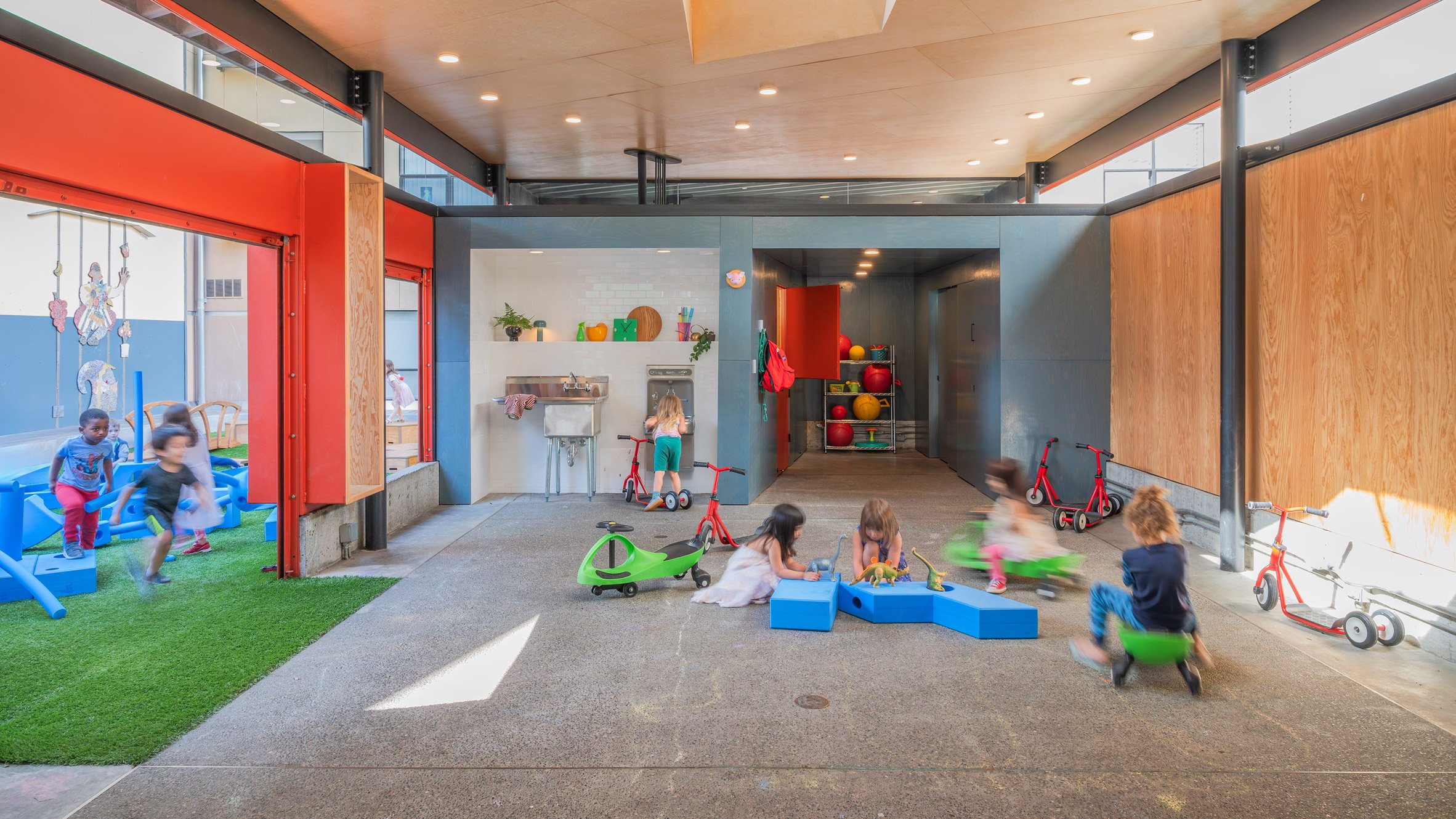 https://static.dezeen.com/uploads/2024/11/pike-market-child-care-preschool-shed-hero.jpg