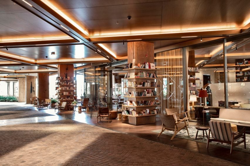 Porte cochere with seating and bookshelves