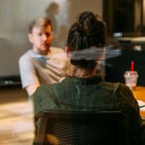 Man and woman at a meeting