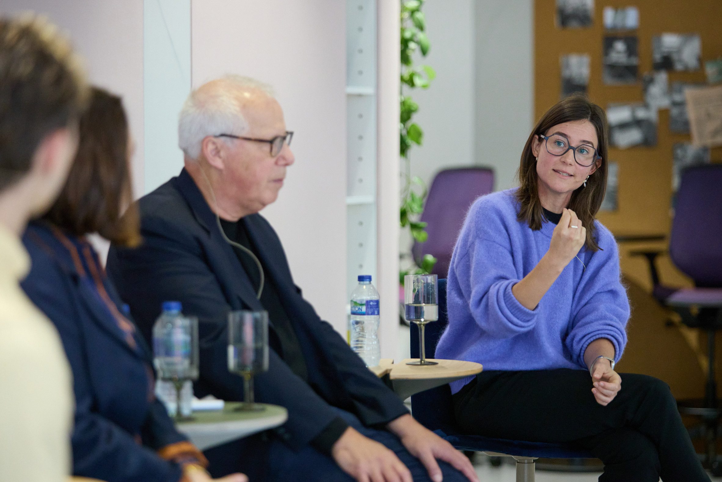 Photo of Elena de Kan speaking on a panel