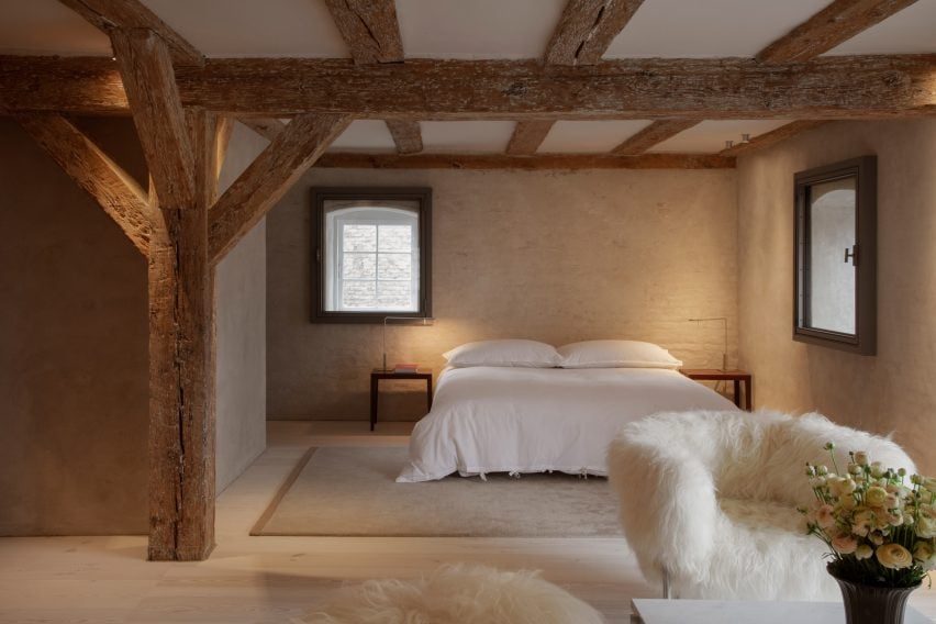 Bedroom in warehouse with structural pine beams