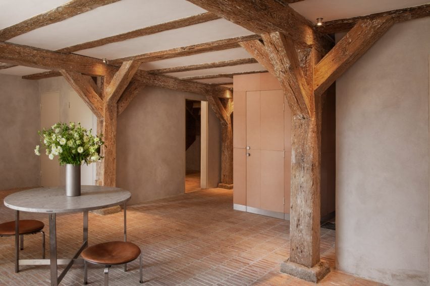 Red brick floors and large pine beams