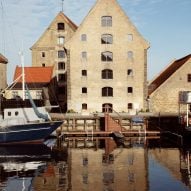 Warehouse apartment building on canal by David Thulstrup