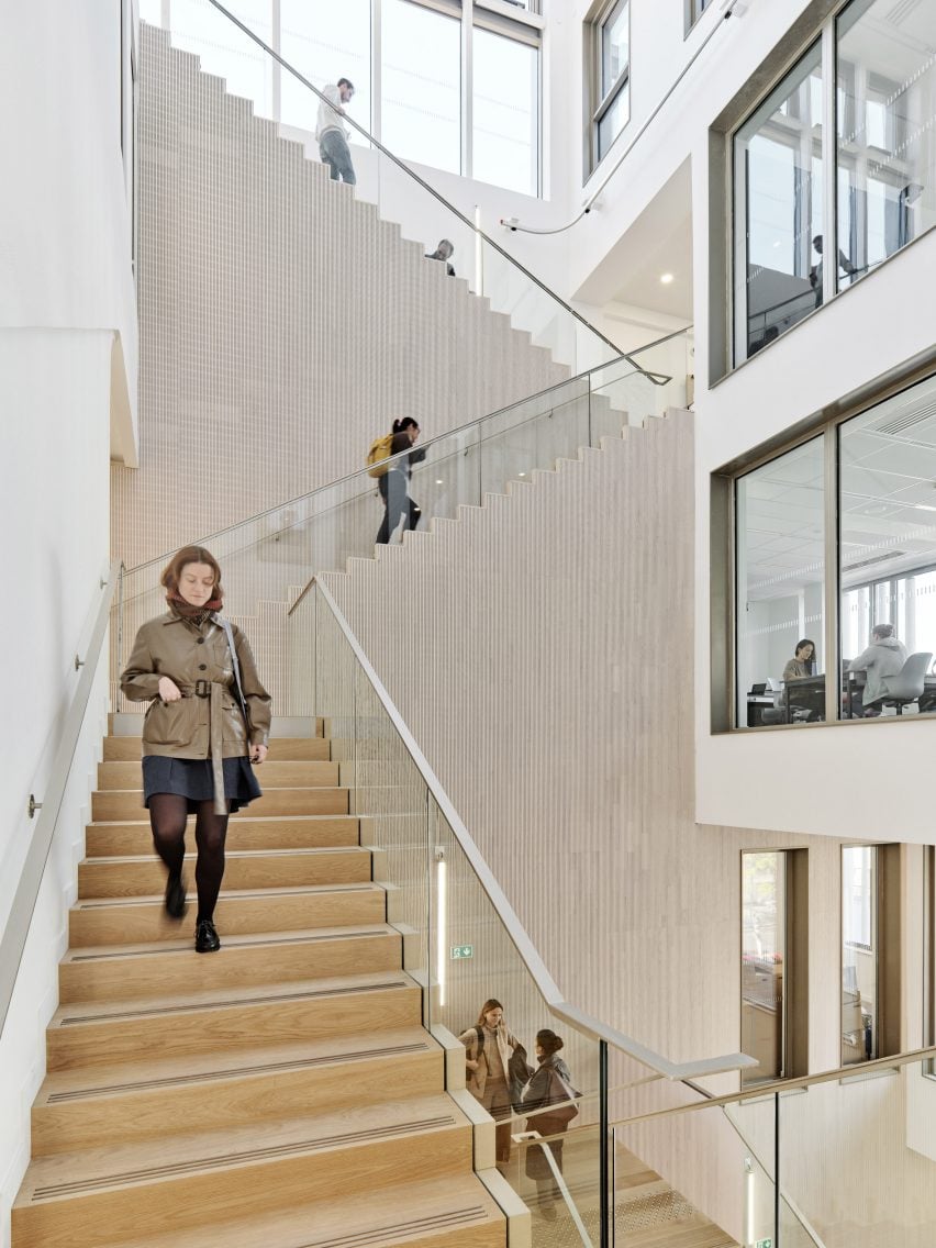 Wood clad staircase in atrium