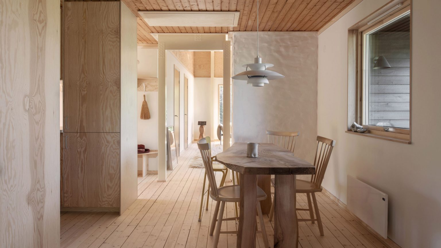 Eight homes where plywood panelling creates warm interiors