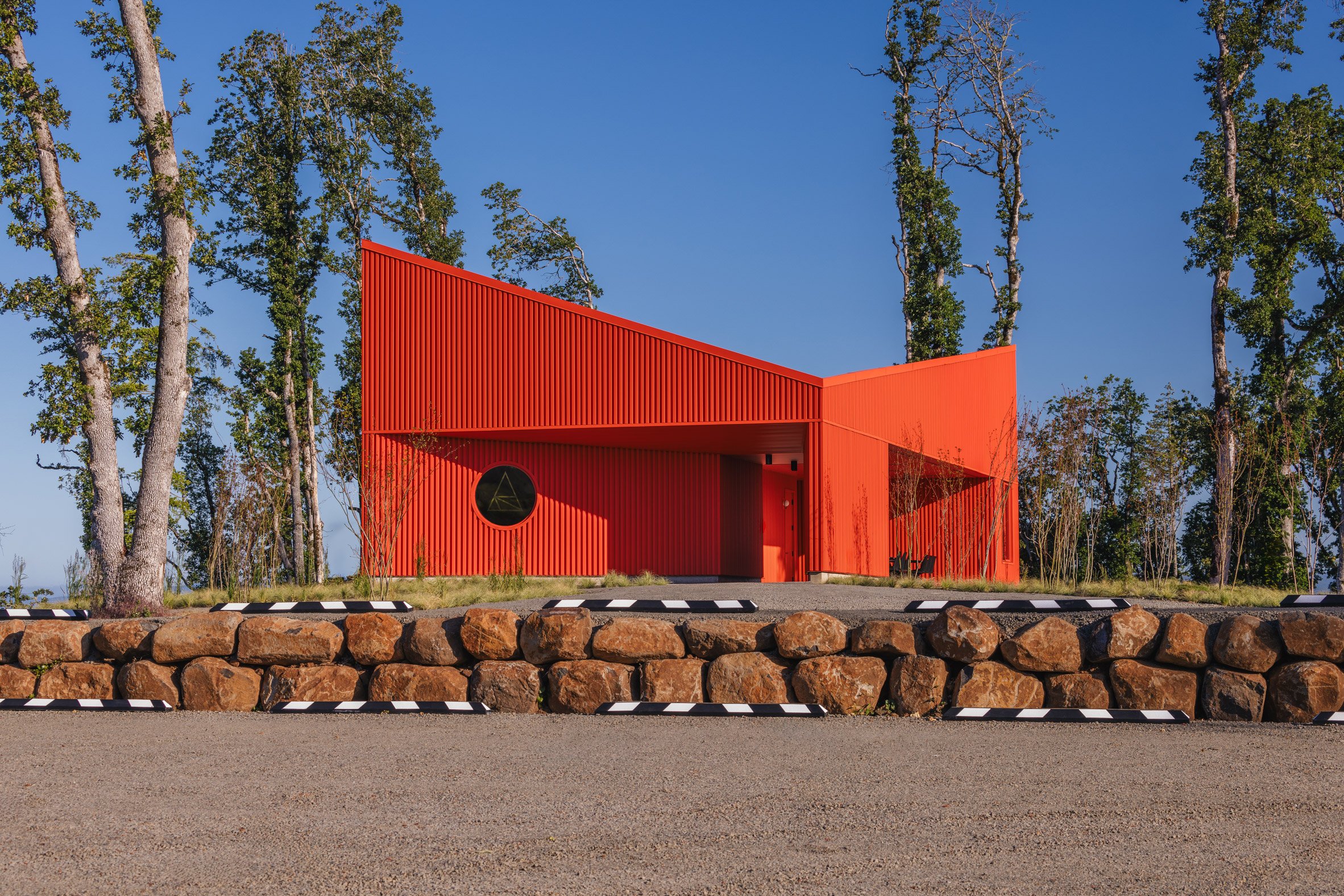 Angular red building with port window