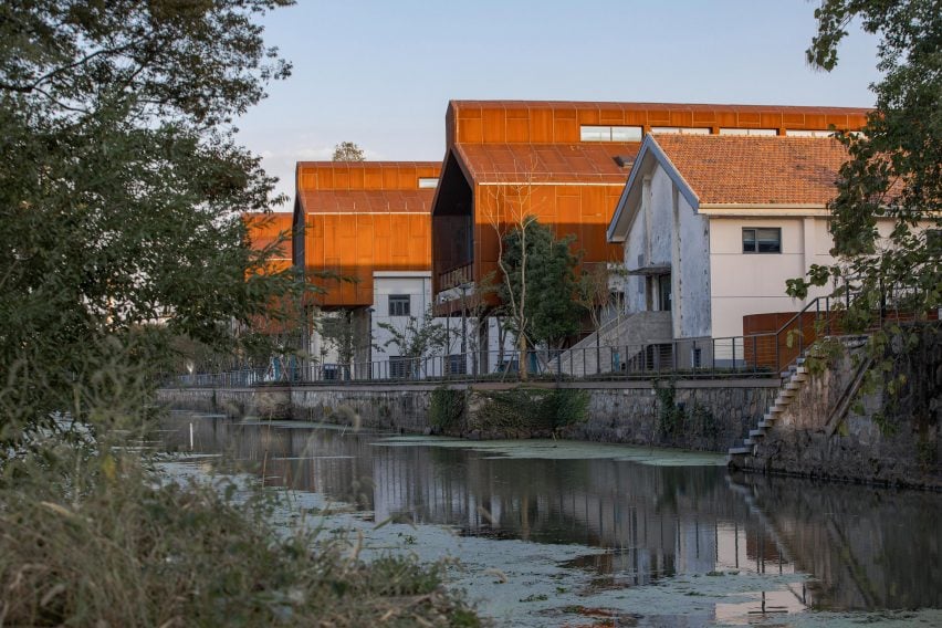 Brewery buildings overlooking water