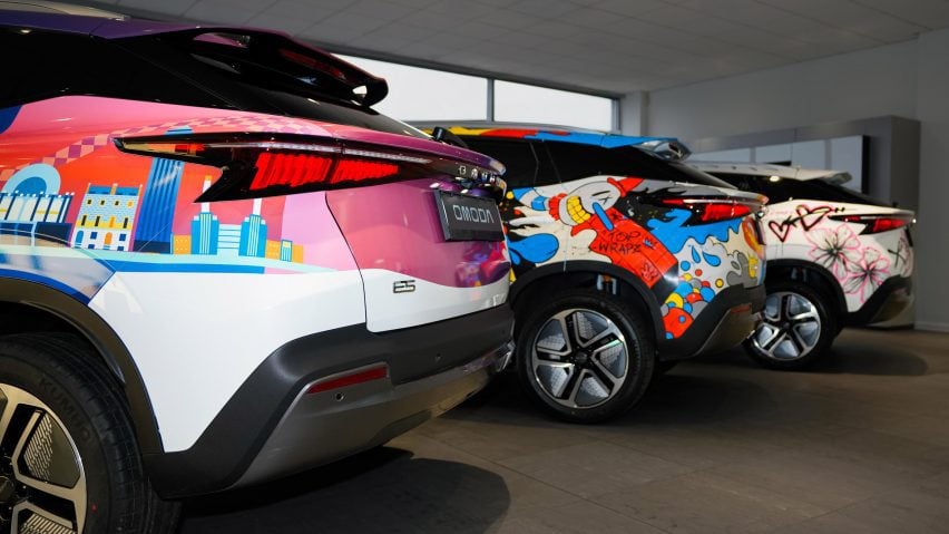 Rear of three Omoda cars next to each other