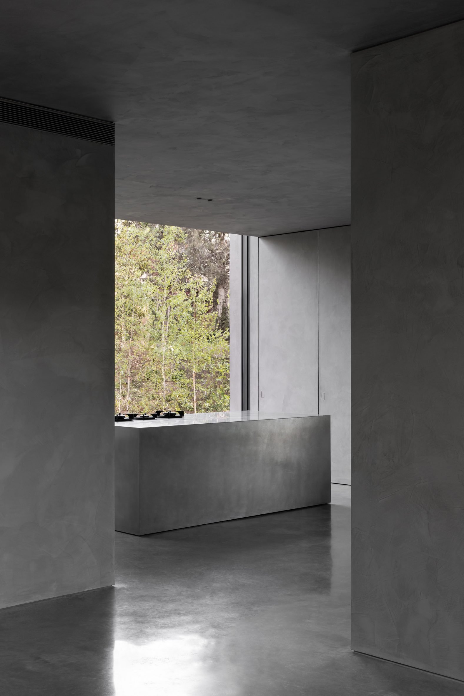 View of kitchen space within Grey House in Australia