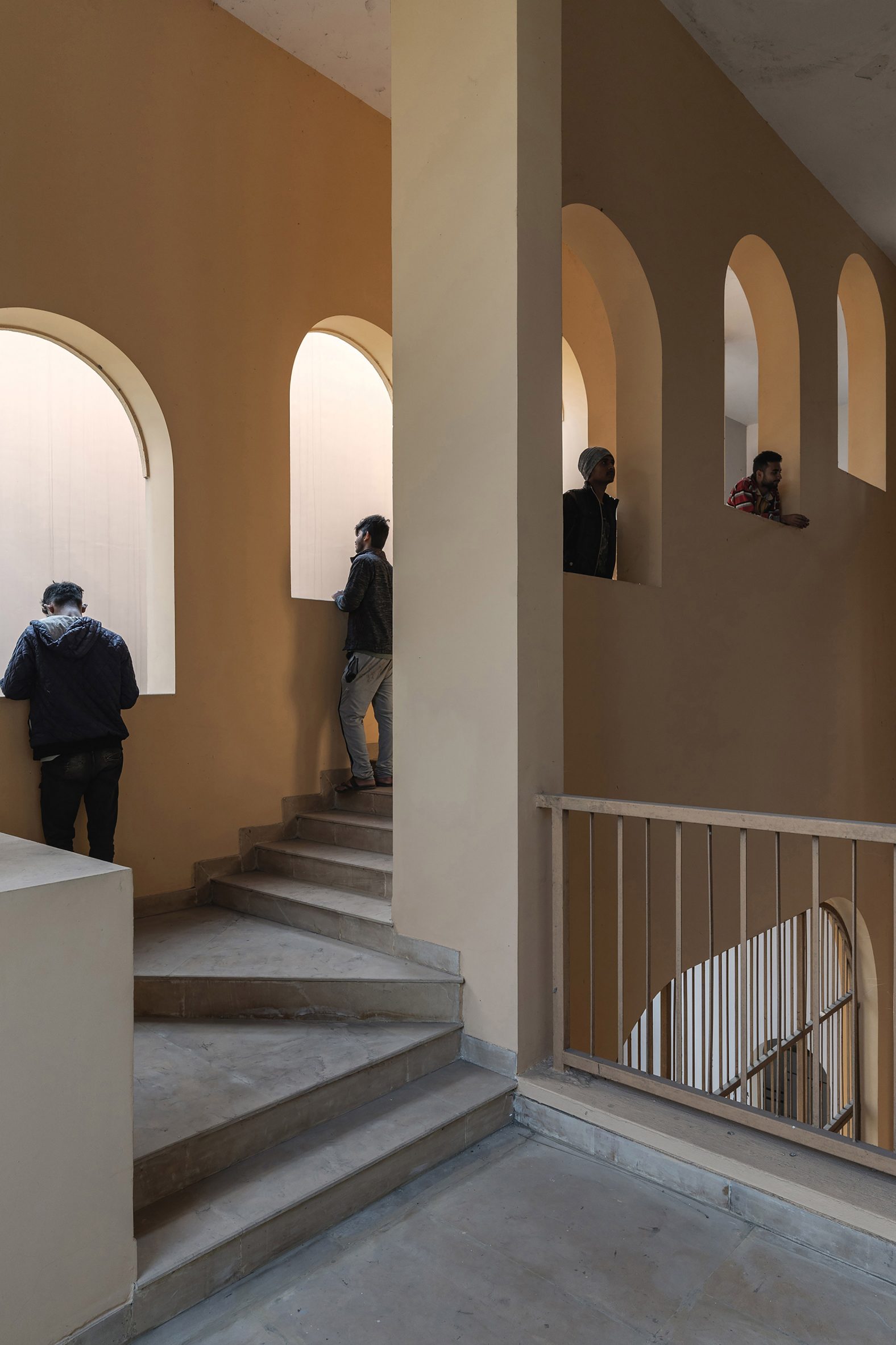 Staircase within community centre by Abin Design Studio