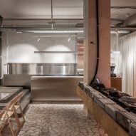 Listening bar Romania with concrete, marble and birch plywood features