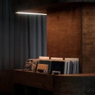 Light highlighting records in birch plywood storage