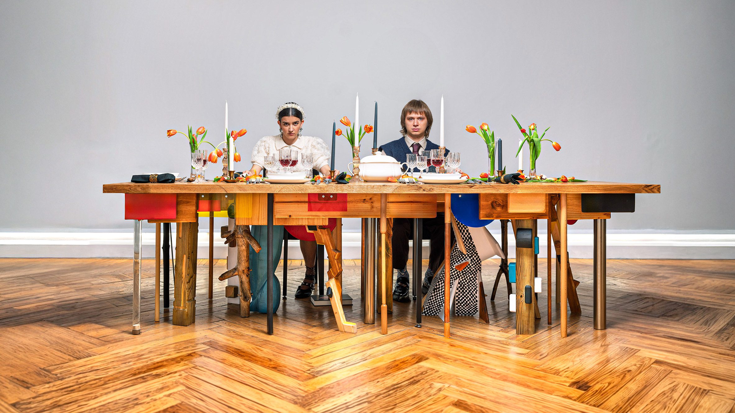 https://static.dezeen.com/uploads/2024/12/capitalism-the-uncomfortable-table-madrid-hero_dezeen_2364_col_0.jpg