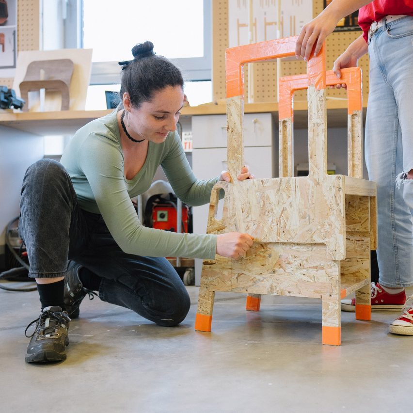 a student with their design work