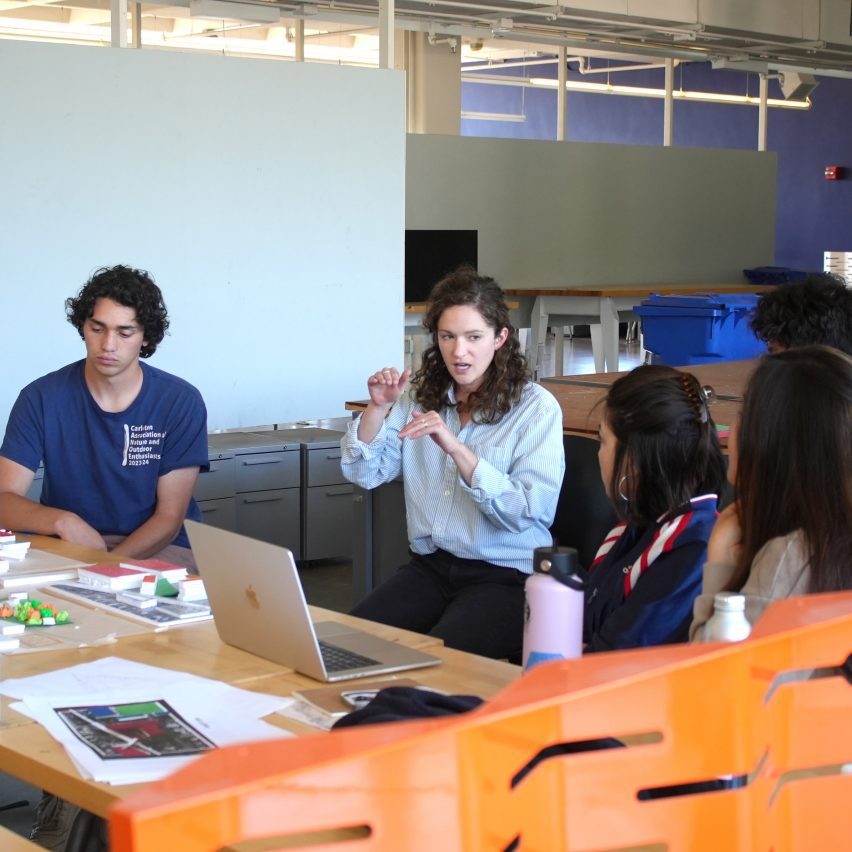 a photograph of students working together