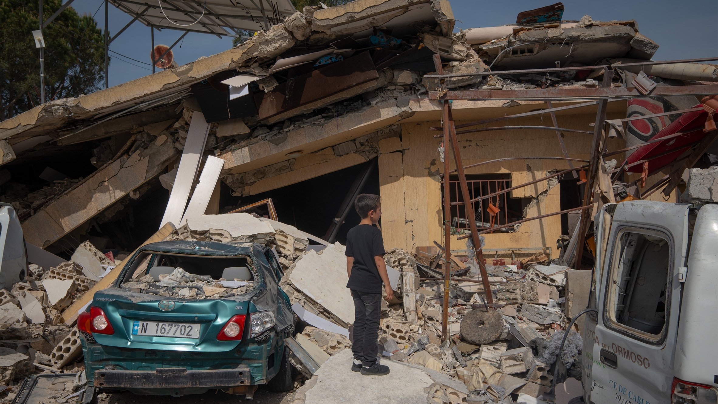 https://static.dezeen.com/uploads/2024/12/hanine-southern-lebanon-bombed-house-hero.jpg