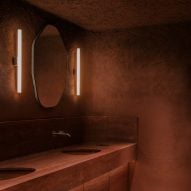 Al-Jawad Pike nestles "womb-like" red bathrooms in London's Holy Carrot restaurant