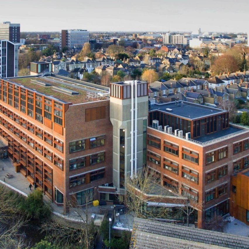 A photograph of a university campus in brown bricks.