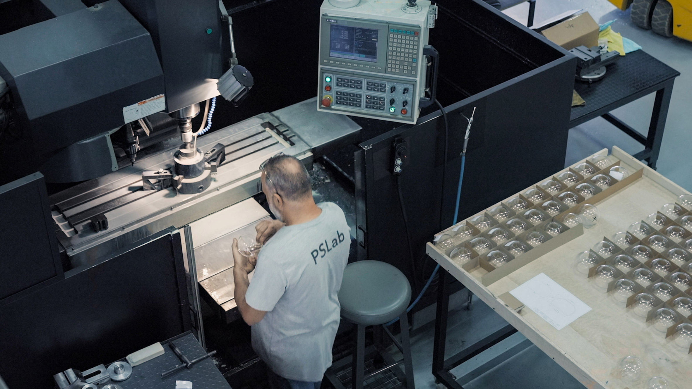 Man working on glassware in PSLab factory in northern Lebanon