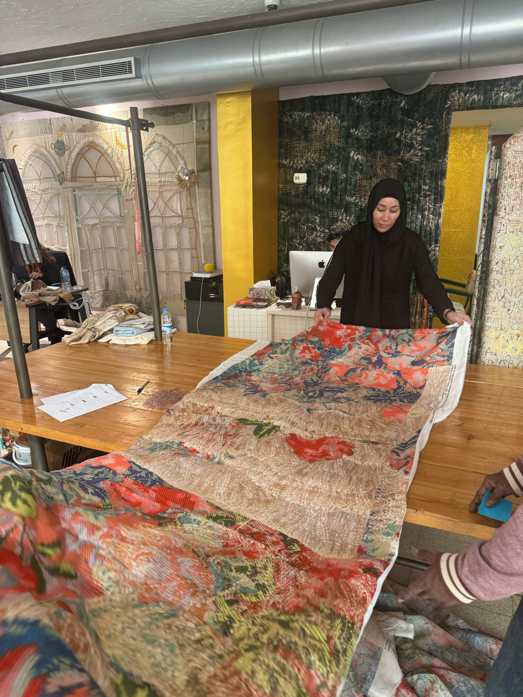 Textile worker in Bokja's temporary atelier in Saifi, Beirut