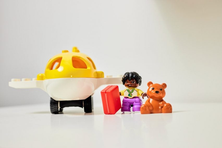 Lego toddler with a sunflower lanyard