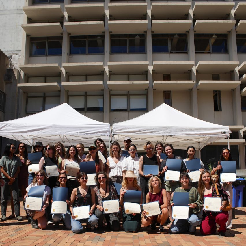 a group of students outside a university building
