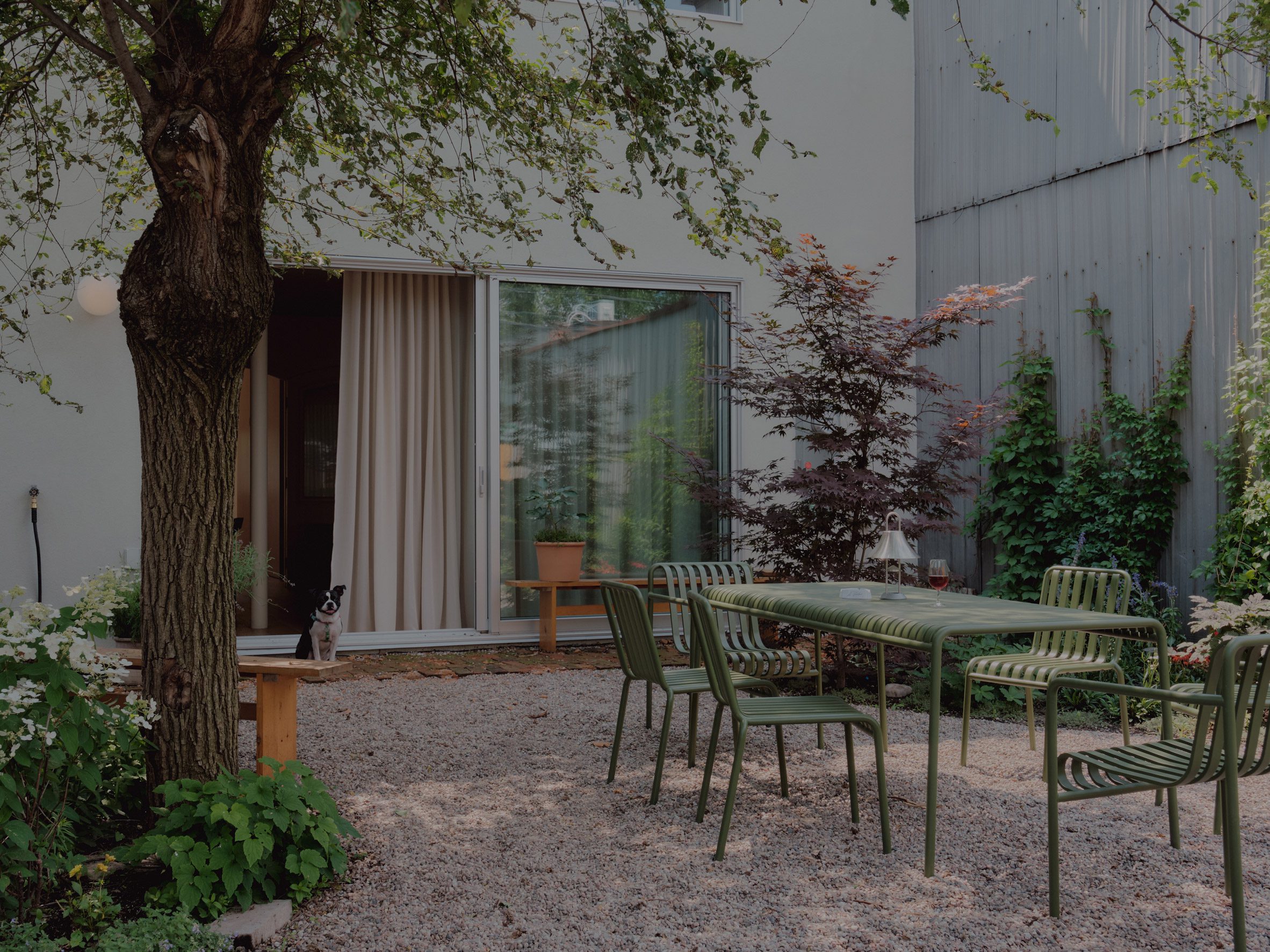 Garden with green chairs 