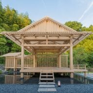 Kengo Kuma embellishes Kyoto hotel with timber-skeleton theatre stage