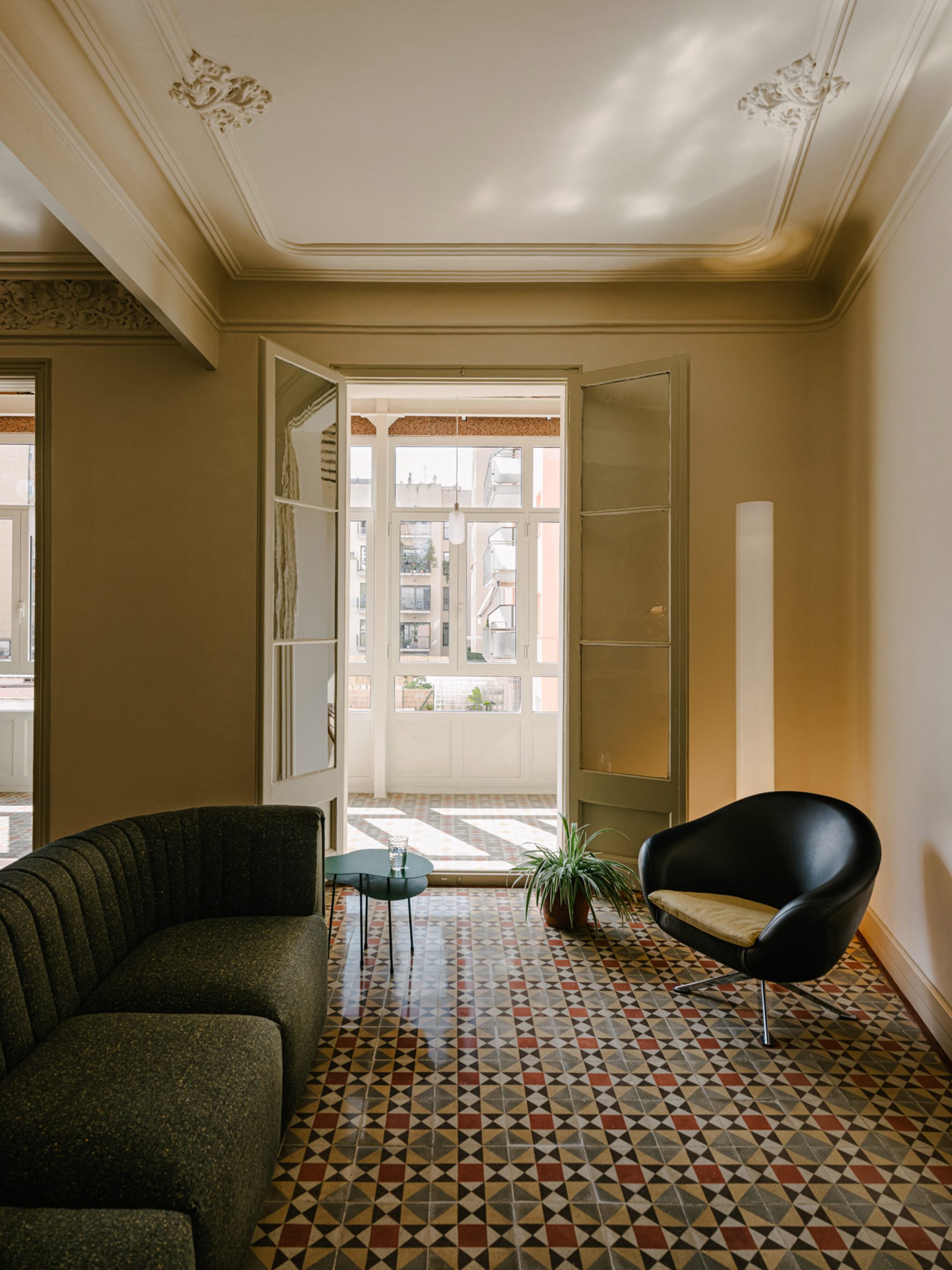 Seating area leading out to an interior patio