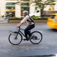 Urban commuter riding bike with electronic conversion kit