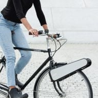 CLIP bike attachment with person riding bike