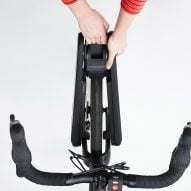 CLIP e-bike conversion device attached to front wheel