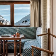 Rooms feature seating areas with colourful brocade upholstery