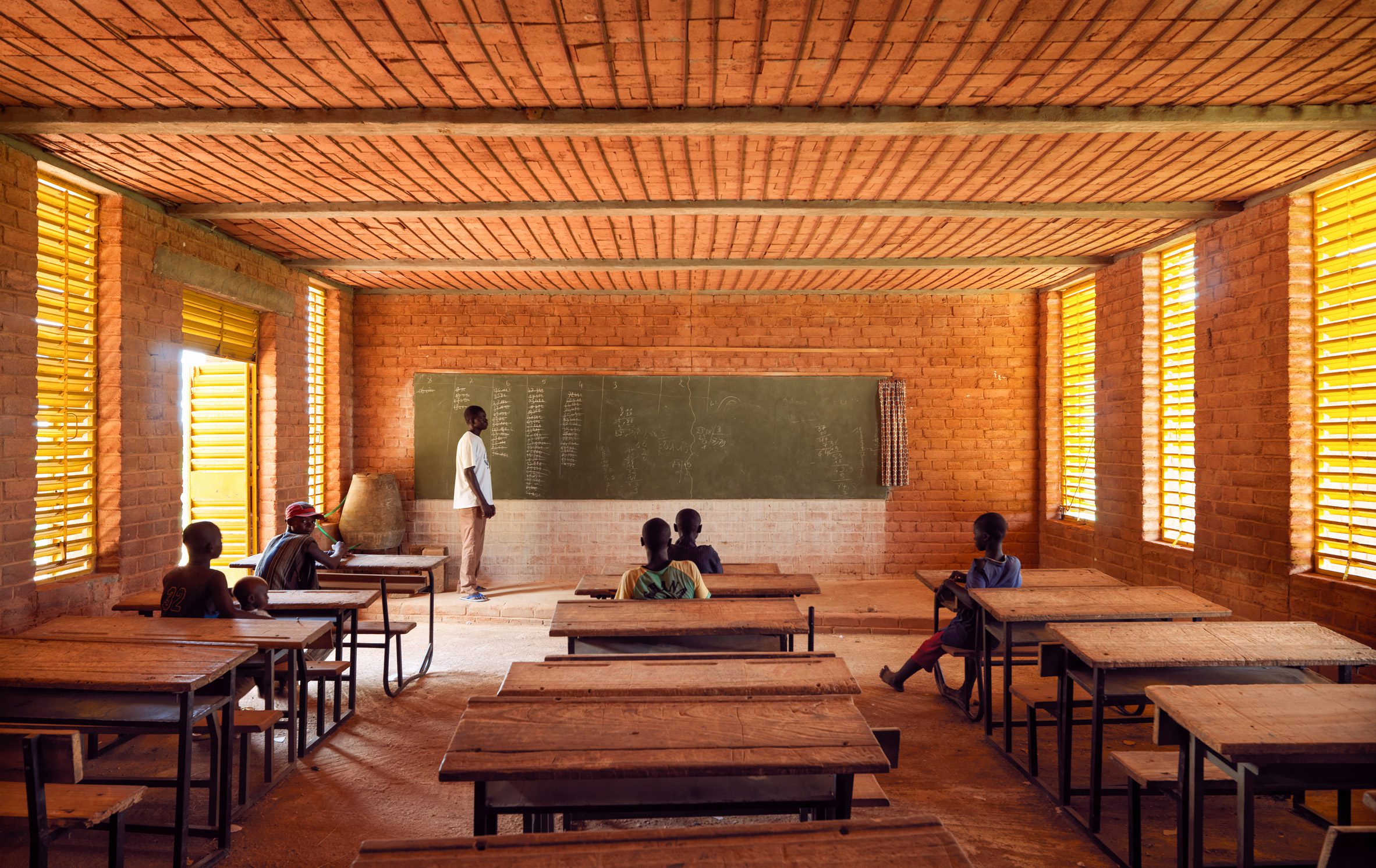 Classroom interior at school by Diébédo Francis Kéré