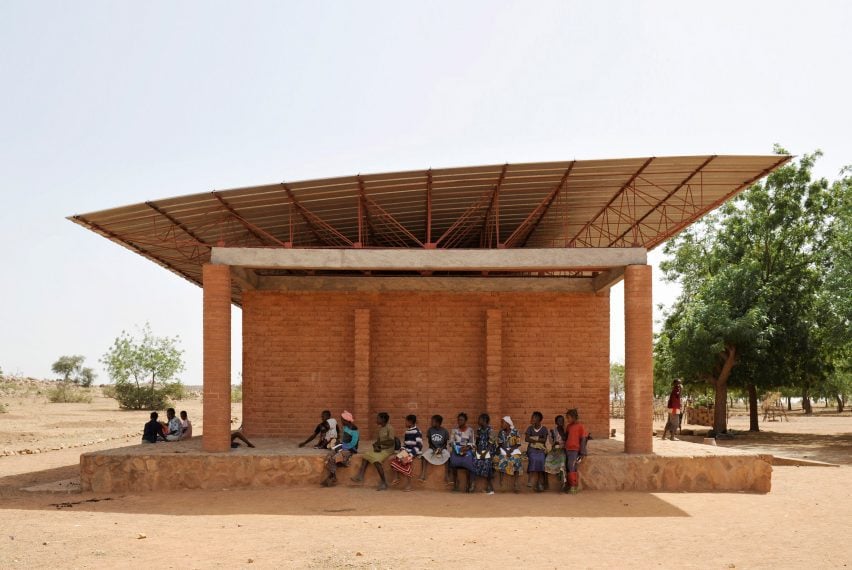 Children sitting outside of the Gando Primary School in Burkina Faso