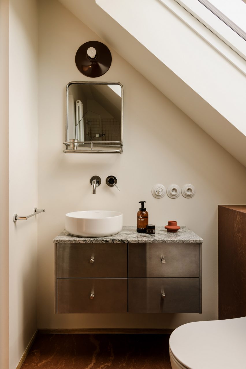 Bathroom with tiled accents