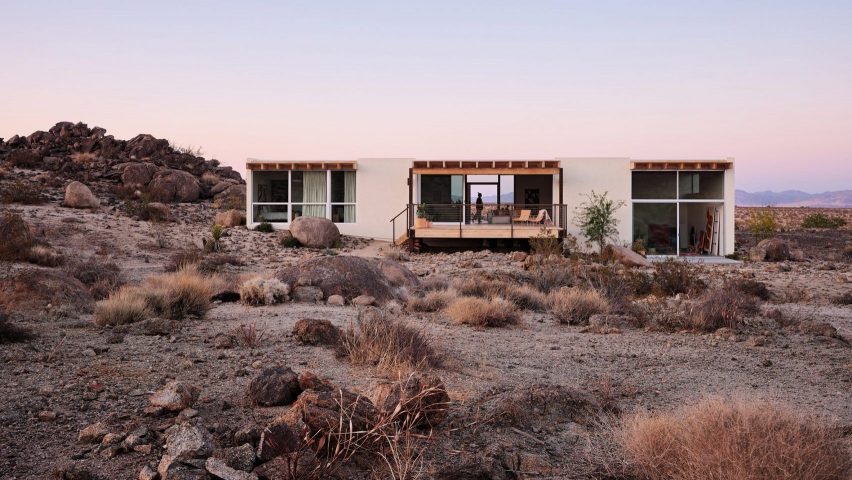 White house in rocky desert environment