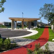 A red running track encircles the design