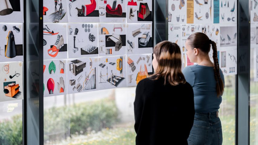 Two students discussing their design project