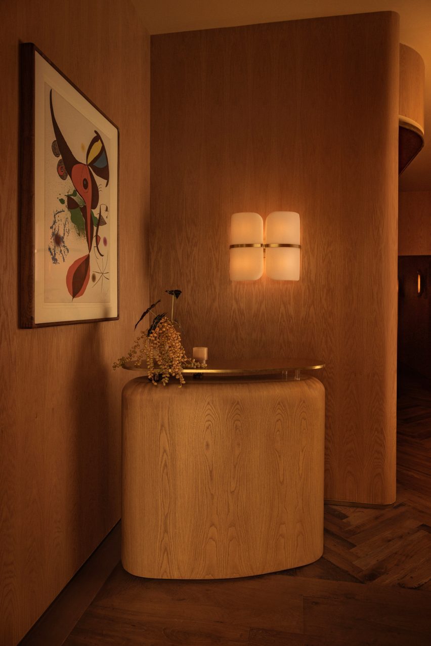 MUSE restaurant entrance with curved wood host stand