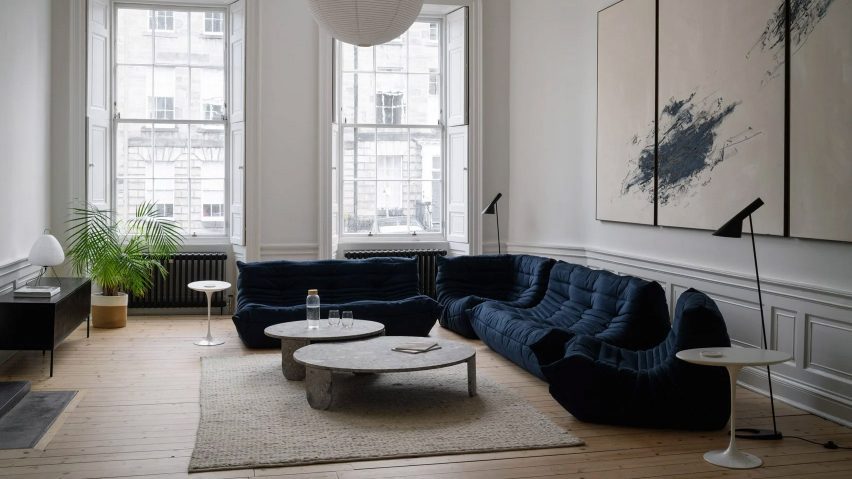 Blue sofa in minimalist living room