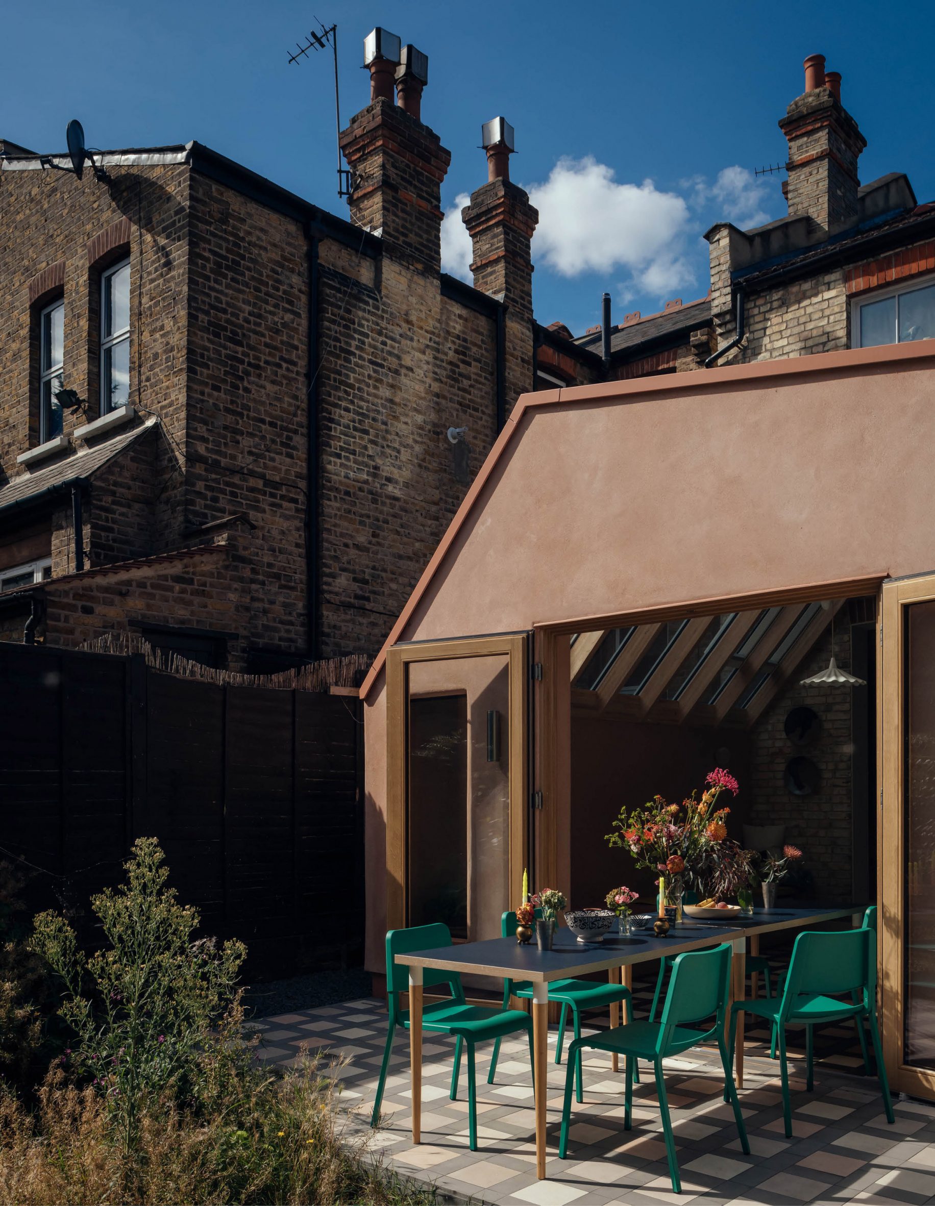 Exterior of London house extension with plaster facade