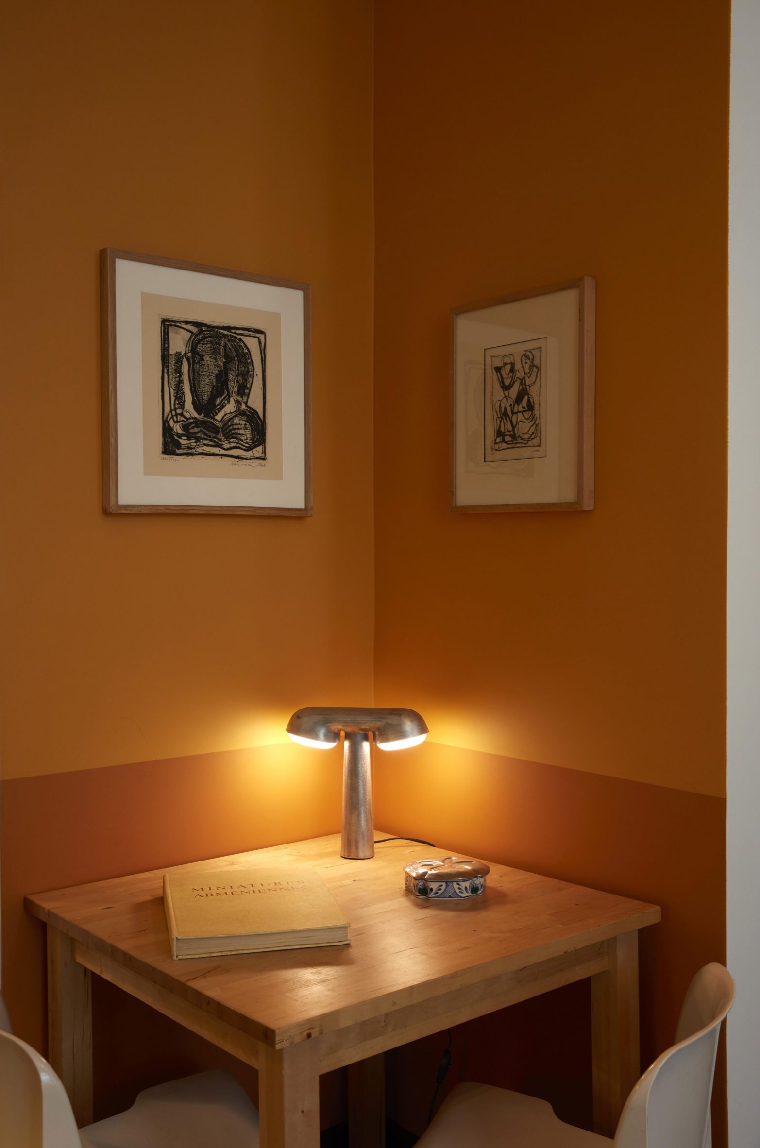 Dining table in Paris pied-à-terre by The House Special Studio.